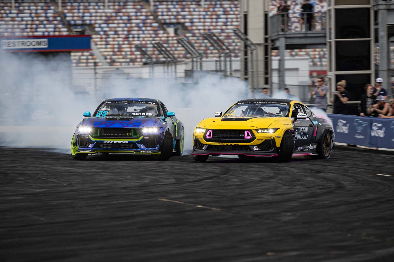 Vaughn Gittin Jr and Ben Hobson drift their 2024 Mustang RTR Spec-5D's at Charlotte Motor Speedway